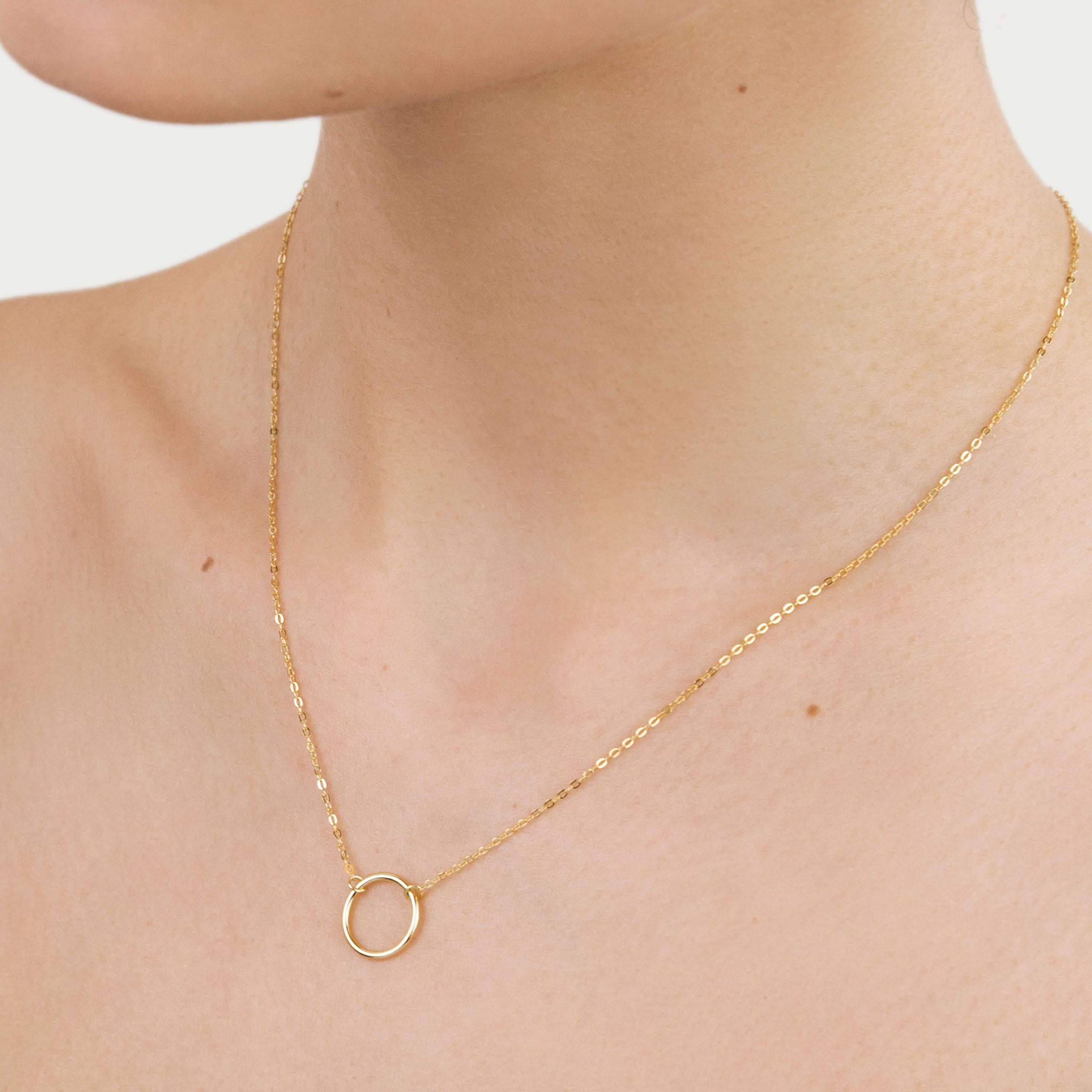 gold necklace circle